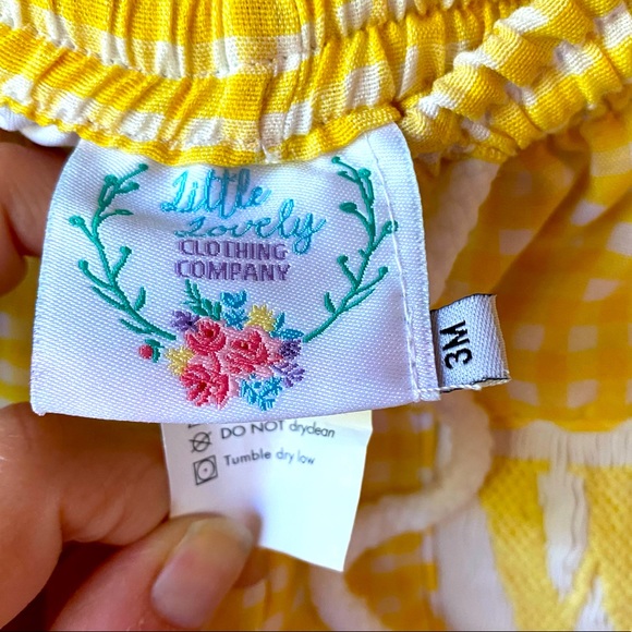 Little Lovely Clothing Company Smocked Yellow “W” Swimsuit - Picture 2 of 3